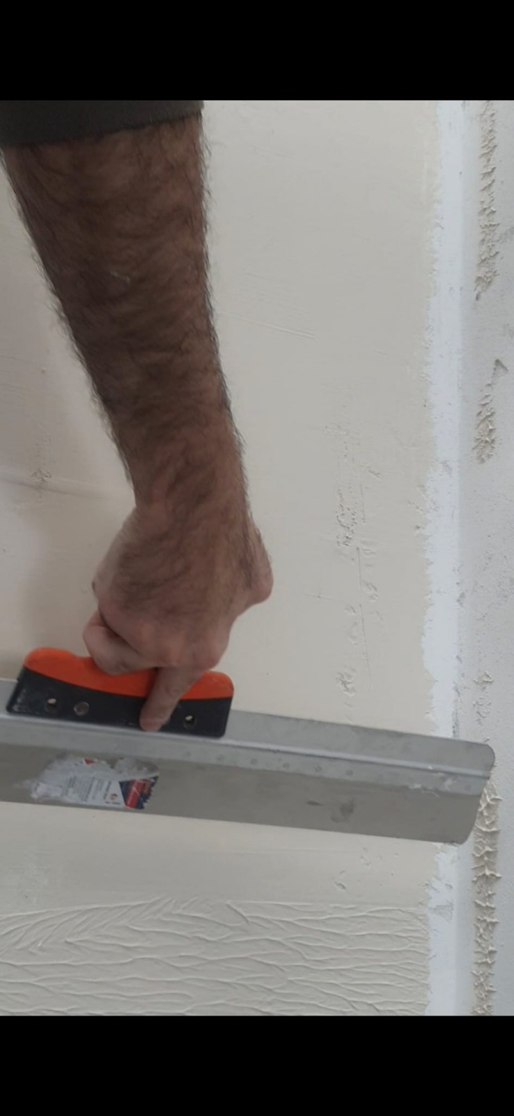 הכנת קירות ויישום שפכטל קירות ותקרה